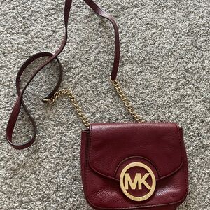 Michael Kors Wine Red Crossbody Bag with Gold Accents